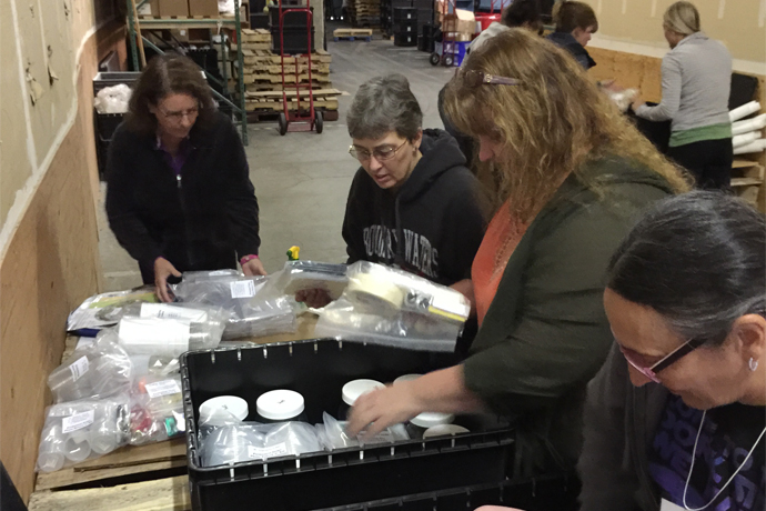 Teachers exercise spatial skills in science kit packing contest