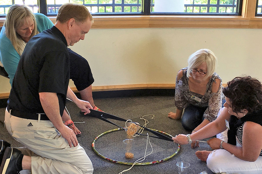 Teaching and Learning leaders working together on a STEM challenge.