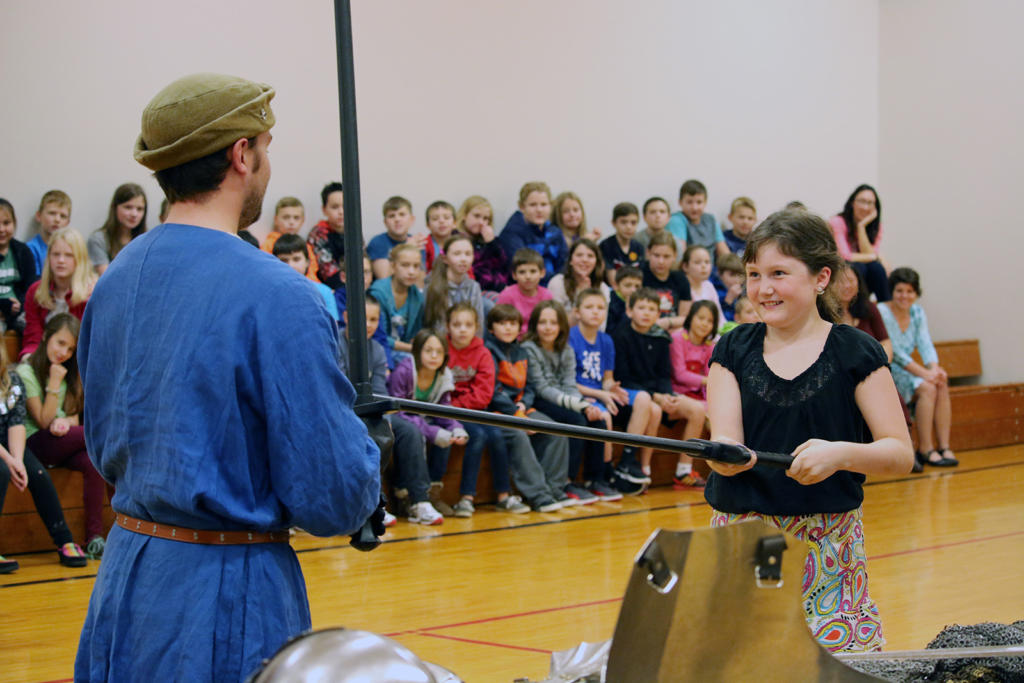 Student participates in assembly