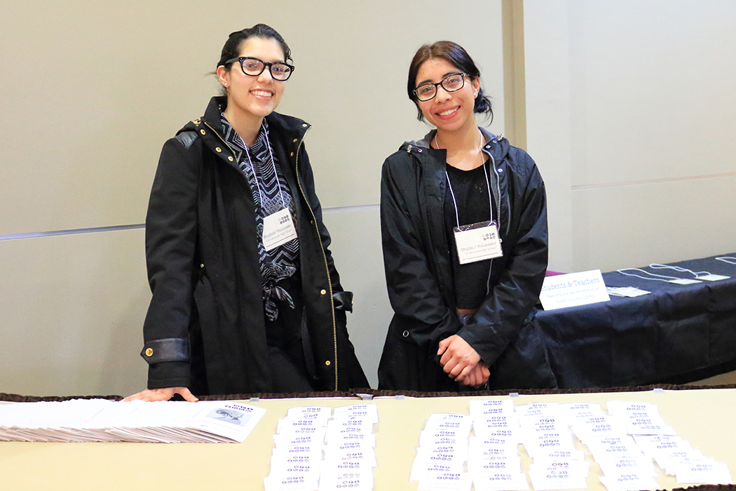 Student volunteers from Fort Vancouver High School hand out programs at the Gallery Opening and Reception.