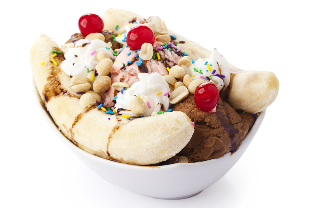 a bowl with a banana split ice cream sundae