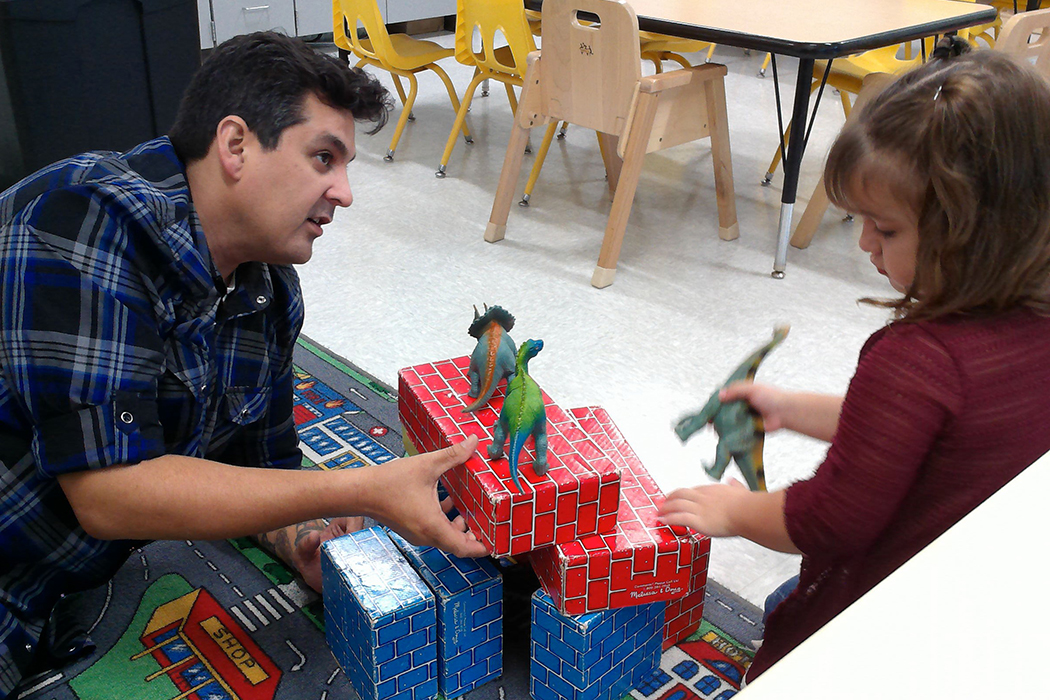 Joe Chamberlain works with a child on social emotional skills at Park Crest.