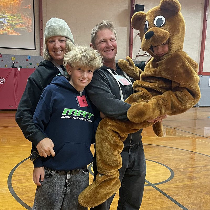 The Dellis family with Silus dressed as the school’s Cub mascot