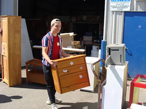 Student moving furniture